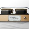 The front side of Muro Box-N40 Standard music box shows a metal plate for adding customized engraving content and a knob for selecting songs to play offline.