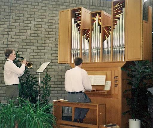 Playing hunting horn (corno da caccia) with organ in a church in Eindhoven (1995).