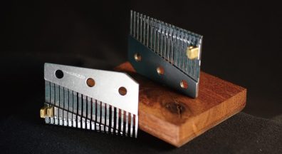 The world's first programmable music box, Muro Box-N40, features a 20-note comb with brass tuning weights added to the back.